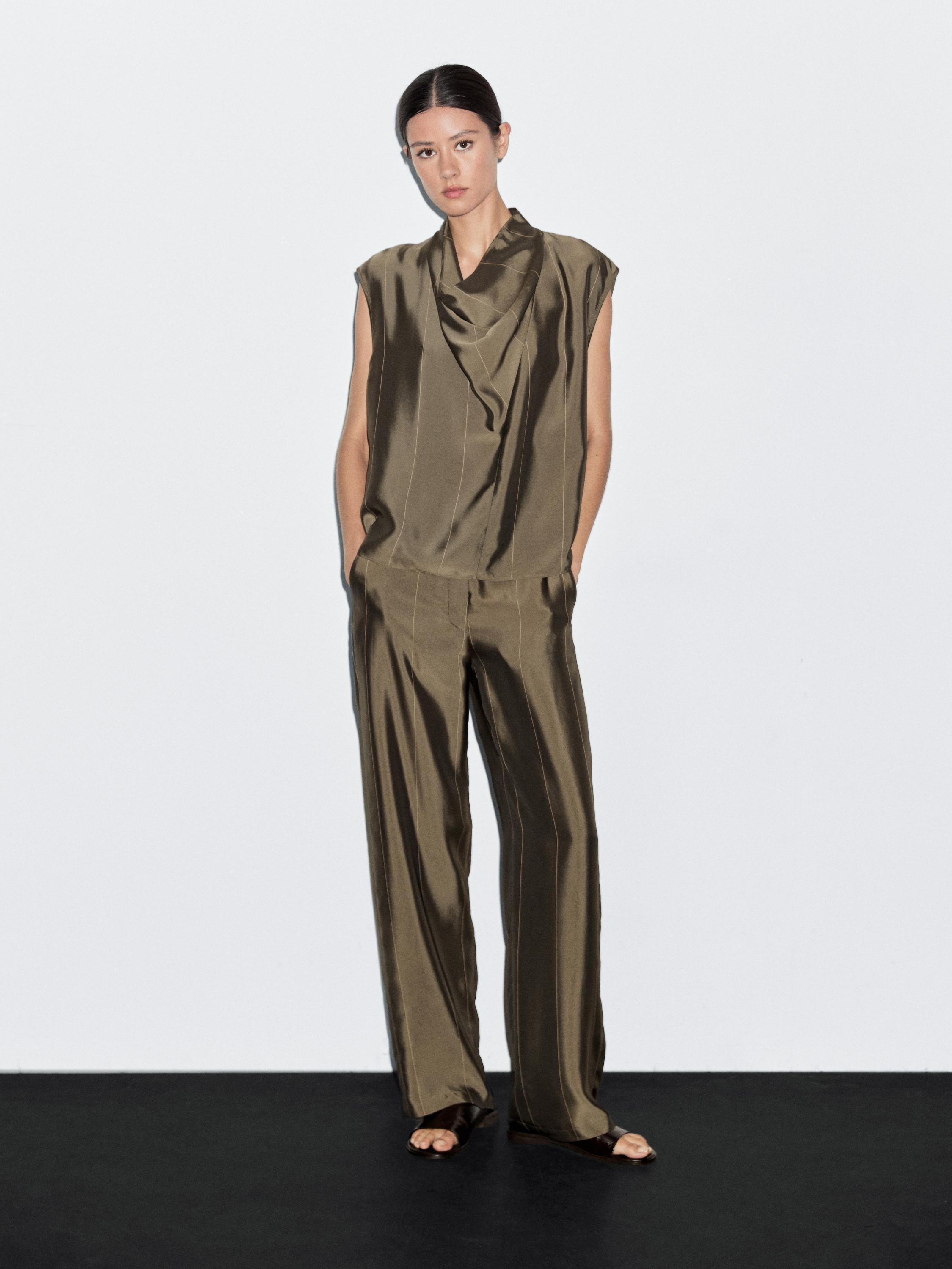 Flowing trousers with striped details